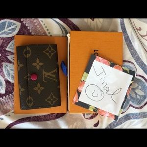 Authentic Louis Vuitton Fuchsia 6 ring pouch